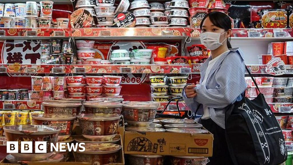 Japan raises interest rate to highest since 1995