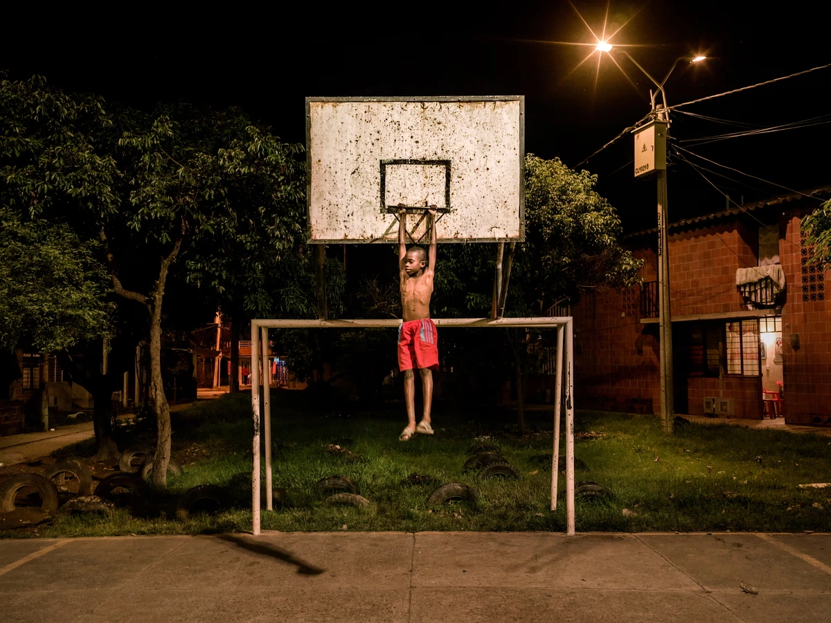 A boy clowning around on a basketball court in a Colombian cocaine corridor: Mads Nissen’s best photograph