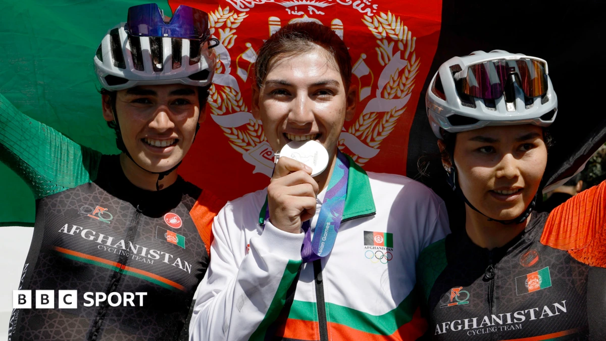 Cyclist who dressed as man to avoid Taliban wins silver medal