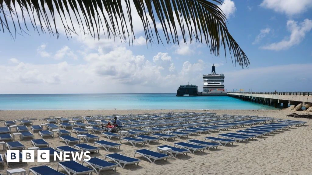 Mum dies after trying to rescue sons swept away at sea