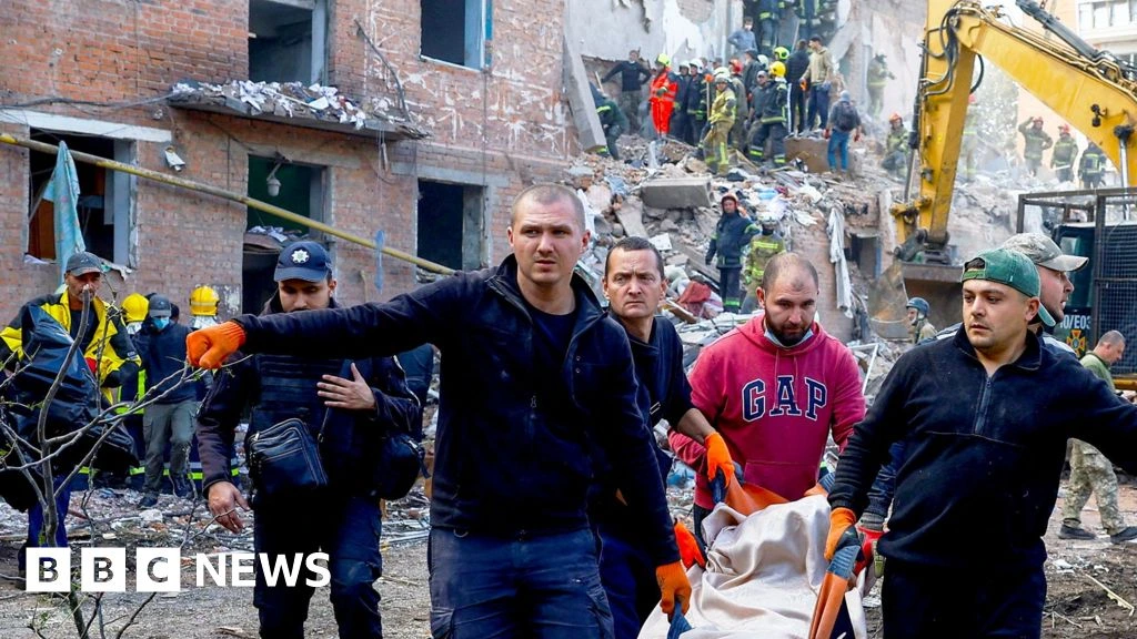 Children killed while they slept as Russian missile kills 19 in block of flats